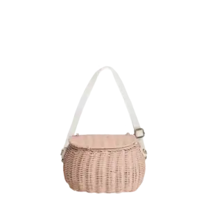 Wicker handbag with pink fabric top and white strap for baby spa accessories.