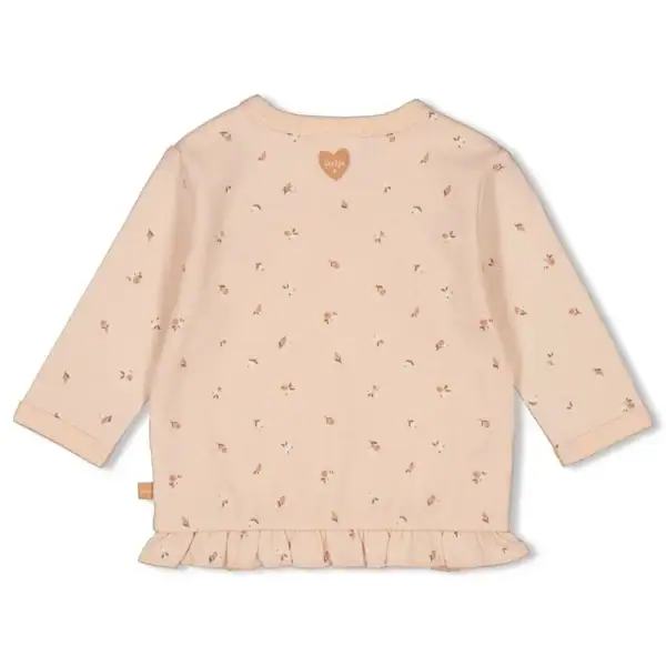Licht roze overslagshirt voor baby's met rozenprint en ruffle details.