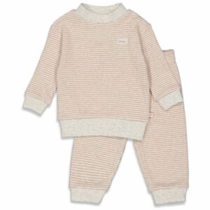 Gezellige babypyjama van wafelstof, perfect voor comfort en warmte.